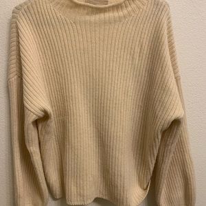 cream sweater